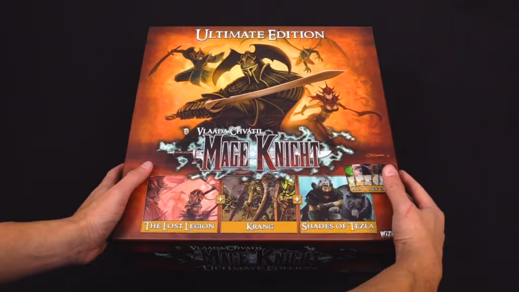 Mage Knight Ultimate Edition box featuring a knight and various game expansions.