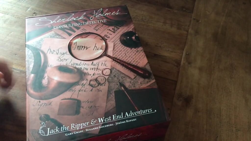 A box of the board game "Sherlock Holmes Consulting Detective: Jack the Ripper & West End Adventures" placed on a wooden surface.