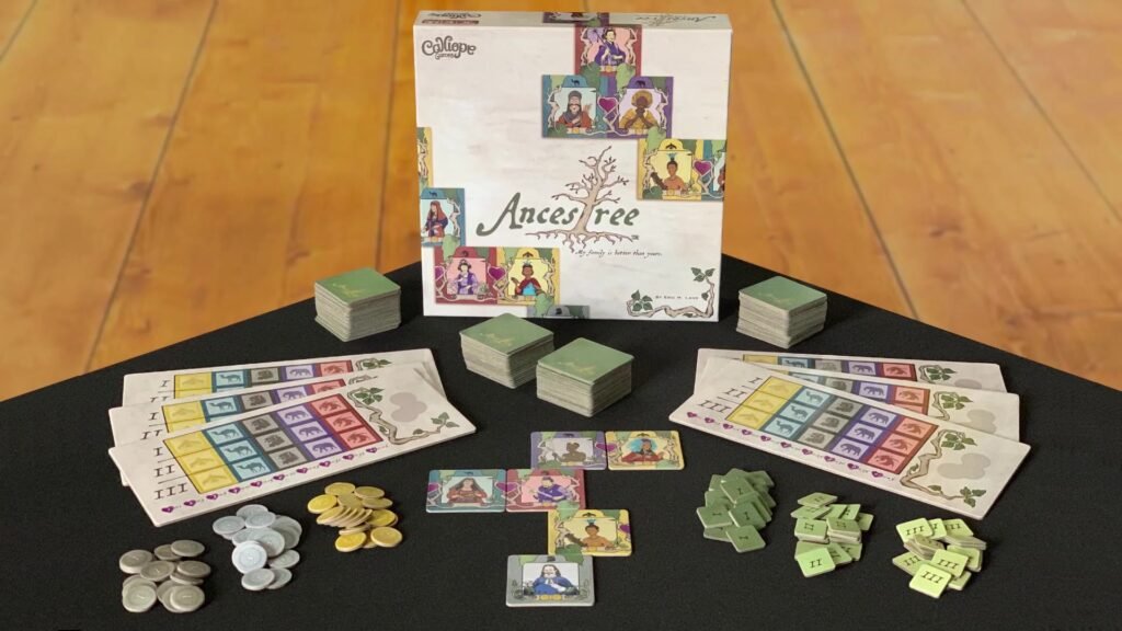 Ancestree board game box and components, including cards, tokens, and player boards, arranged on a wooden table.
